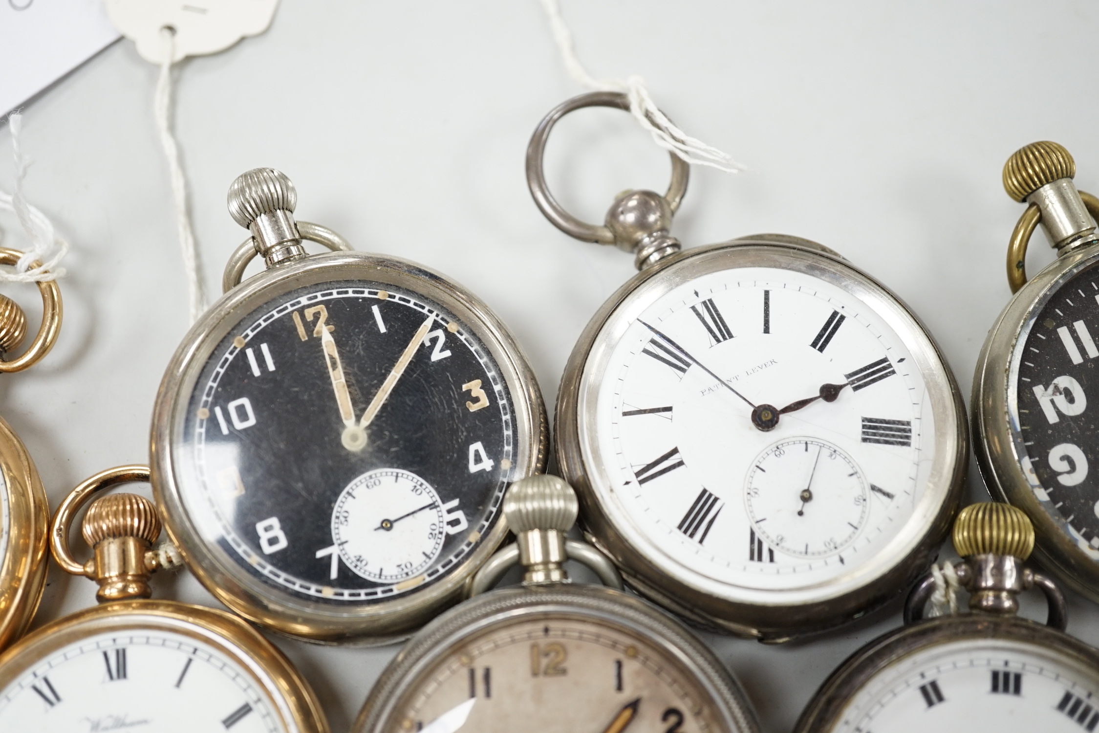 Eleven assorted gold plated or base metal pocket watches including three Waltham and Doxa military black dial.